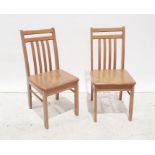 Four modern beech slat-back chairs