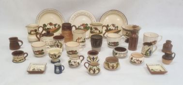 Large quantity of Devon pottery motto ware including cups, jugs, teapot, etc and a quantity of other