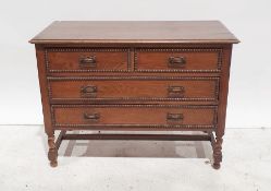 20th century oak chest of two short over two long drawers on barleytwist and block supports,