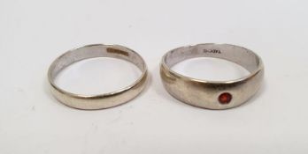 9ct white gold ring set with tiny red stone, 3g approx. and a 9ct white gold wedding band, 1.5g