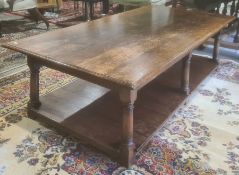 20th century rectangular oak coffee table on turned and block supports, shelved undertier, H47cm X