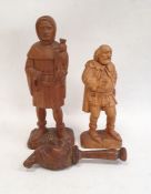 Carved wooden figure, Falconer, by Patrick Conoley of a man holding a falcon, dated 1969, 27cm high,