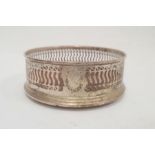20th century silver wine coaster with pierced sides, on turned wooden base, Birmingham, maker WI