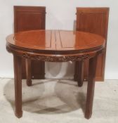 20th century Chinese hardwood extending dining table and six chairs