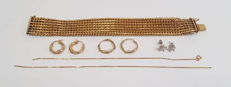 A Charles Murat gold coloured metal heavy chain link bracelet, a pair of 9ct gold hoop earrings,