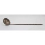 Silver-coloured mounted ladle inset with George II coin and repousse decorated, with turned handle