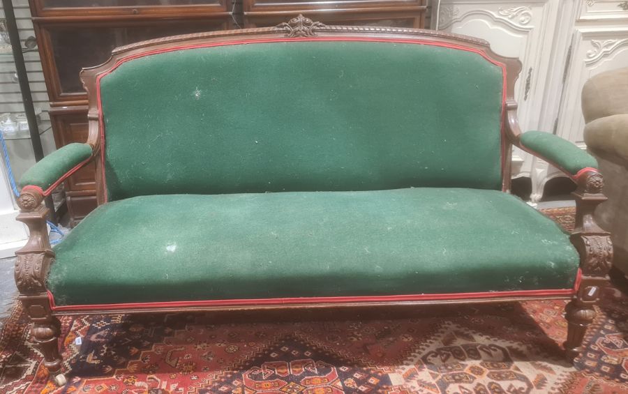 Victorian sofa mahogany frame, green upholstered seat back and armrests, turned and fluted front