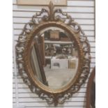 Oval mirror in modern moulded acanthus leaf frame