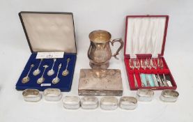 Silver plated mounted rectangular box, an EPNS tankard, various napkin rings, flatware, etc