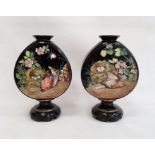 Pair of Victorian opaque black glass vases of shaped moonflask design, on circular pedestal bases,
