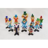 Murano glass clown holding a ball, with green top hat, 31cm high and nine smaller Murano glass