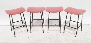 Four Kandya red seated metal framed stools (4)