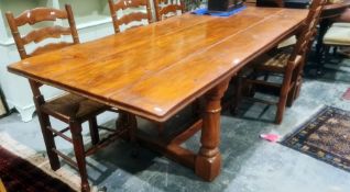 Modern rectangular table on turned and block supports, stretchered base, approx. 210cm