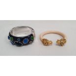 Blue ground and white metal bangle set simulated blue and green stones and a reproduction Cartier