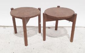 Pair mid-20th century modern teak side tables of circular form with turned supports, 35cm