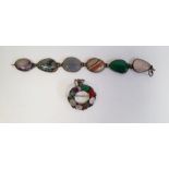 Agate bracelet, the six different agate panels in silver-coloured mounts, marked silver and a brooch