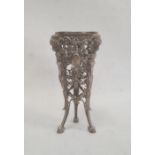 19th century silver-coloured metal trumpet-shaped vase holder, elaborately decorated, pierced with