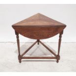20th century triangular table with drop leaves and rotating top to make circular table, turned