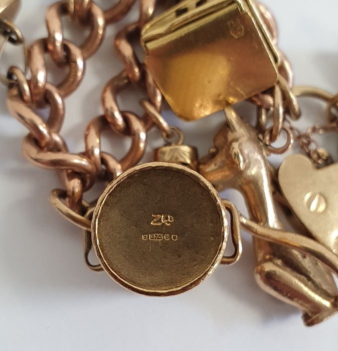 9ct gold curb link bracelet with 9ct gold padlock clasp, hung with assorted charms including a - Image 3 of 16