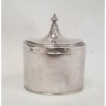 A George V silver tea canister, oval with pointed finial, Birmingham 1934, makers Mappin and Webb,