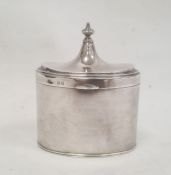 A George V silver tea canister, oval with pointed finial, Birmingham 1934, makers Mappin and Webb,