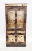 Pair of Chinese style cabinets with painted decoration, two closed doors above two single drawers,