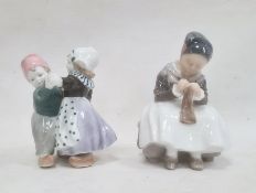 Royal Copenhagen figure of a girl knitting, no.1314 to base and an ENS figure group of a pair of