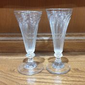Two 18th century jelly glasses, both of wrythen design, with knopped stems and circular feet, 14cm