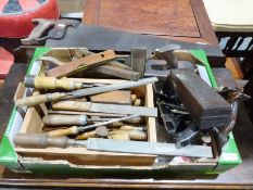 A box of vintage hand tools to include planes, saws, files, spirit levels etc.