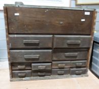 Wooden tool box containing various tools to include spanners, pliers, drill bits, etc.