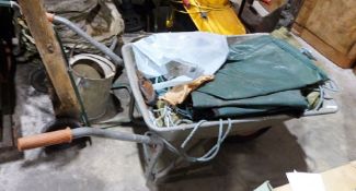 Wheelbarrow and contents of tarpaulins, etc