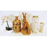 Carved wooden sculpture of a hare, a wooden vase, two porcelain vases with applied flower decoration