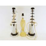Pair of 'Ceva' chrome table lamps and an alabaster table lamp (3)