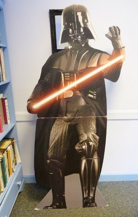 Large cardboard cut out of Darth Vader