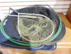 Assorted fishing rods and fishing nets