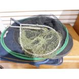 Assorted fishing rods and fishing nets