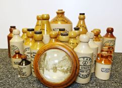 Collection of vintage pottery beer bottles and flagons relating to Oxfordshire and Gloucestershire