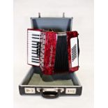 Weltmeister 'Serino' red accordion with case
