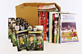 Collection of football ephemera to include approximately 250 football programs from the 1980's,