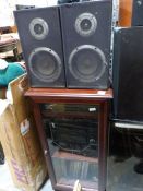 Sony stereo system and speakers in glazed wooden cabinet