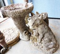 Collection of assorted stone garden animal ornaments and plant pots
