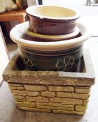 Four assorted plant pots and planters