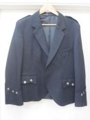 Gentleman's wool jacket in charcoal with horn buttons, a wool kilt in navy, black, green, red and