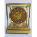 Atmos Jaeger-Le-Coultre clock in brass and glazed case, serial no. 75177, with customer's