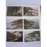 Early 20th century album of souvenir postcards including Torquay, Margate, Falmouth, a smaller album