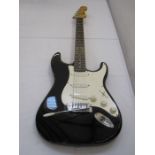 Squier Strat by Fender electric guitar with Emex European hard case, 100cm long approx.  Condition
