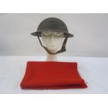 WWII Home Guard helmet with red material manufactured in Stroud factory for the Royal Guards uniform