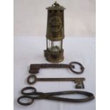 Large '21' key, another large key, a miner's lamp 'The Protector Lamp and Lighting Company