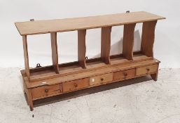 Vintage pine wall-hanging rack with pigeonhole type shelves above five short drawers, 109cm x 56cm