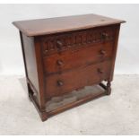 20th century oak chest of three long drawers, the rectangular top with moulded edge above the